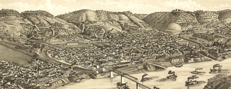 A detailed bird's-eye drawing of Bellaire on the Ohio River, with houses climbing the hills, rail lines along the river and an iron railroad bridge crossing to the West Virginia side, with steamboats on the water.